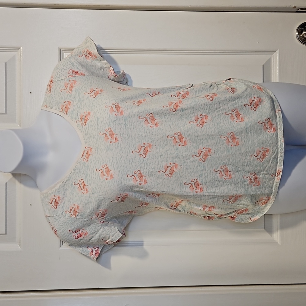 Lane Bryant, v-neck, pink flamingo tee with rushed sides. Size 14-16